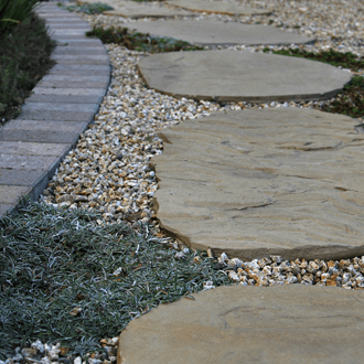 stone garden path curved border