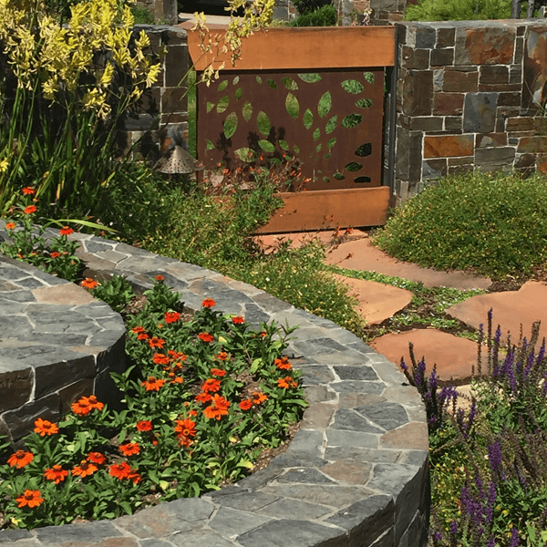 curved stone spiral planting bed