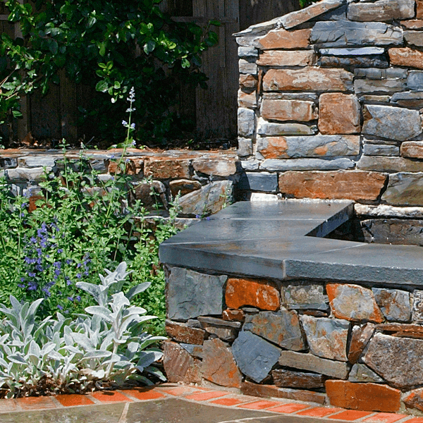 stone fountain curved wall bench