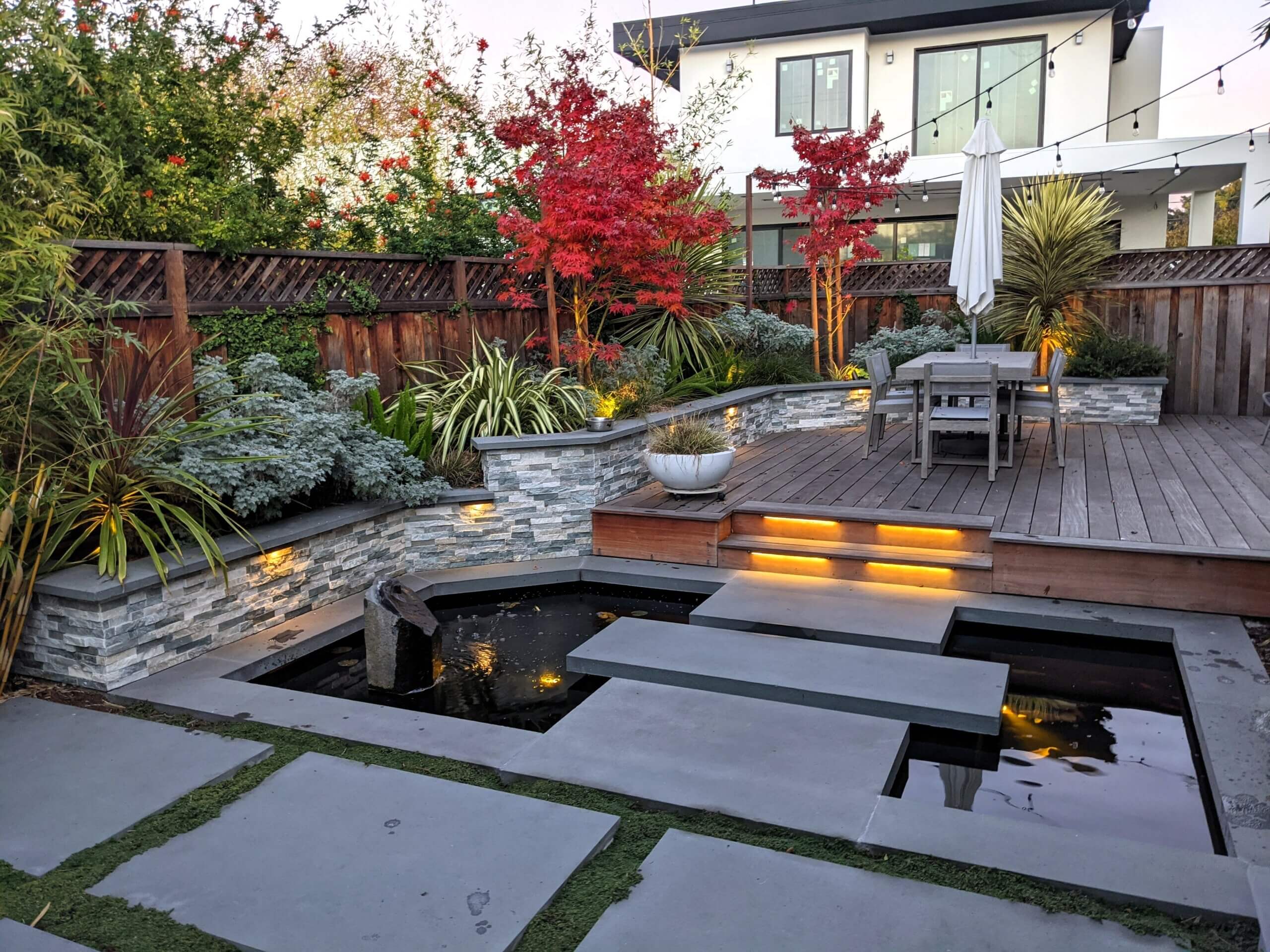 Zen backyard lands0sape showing red fall foliage colors