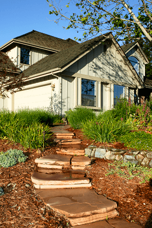 Lovely custom natural flagstone stairs leading to front entrance of California home