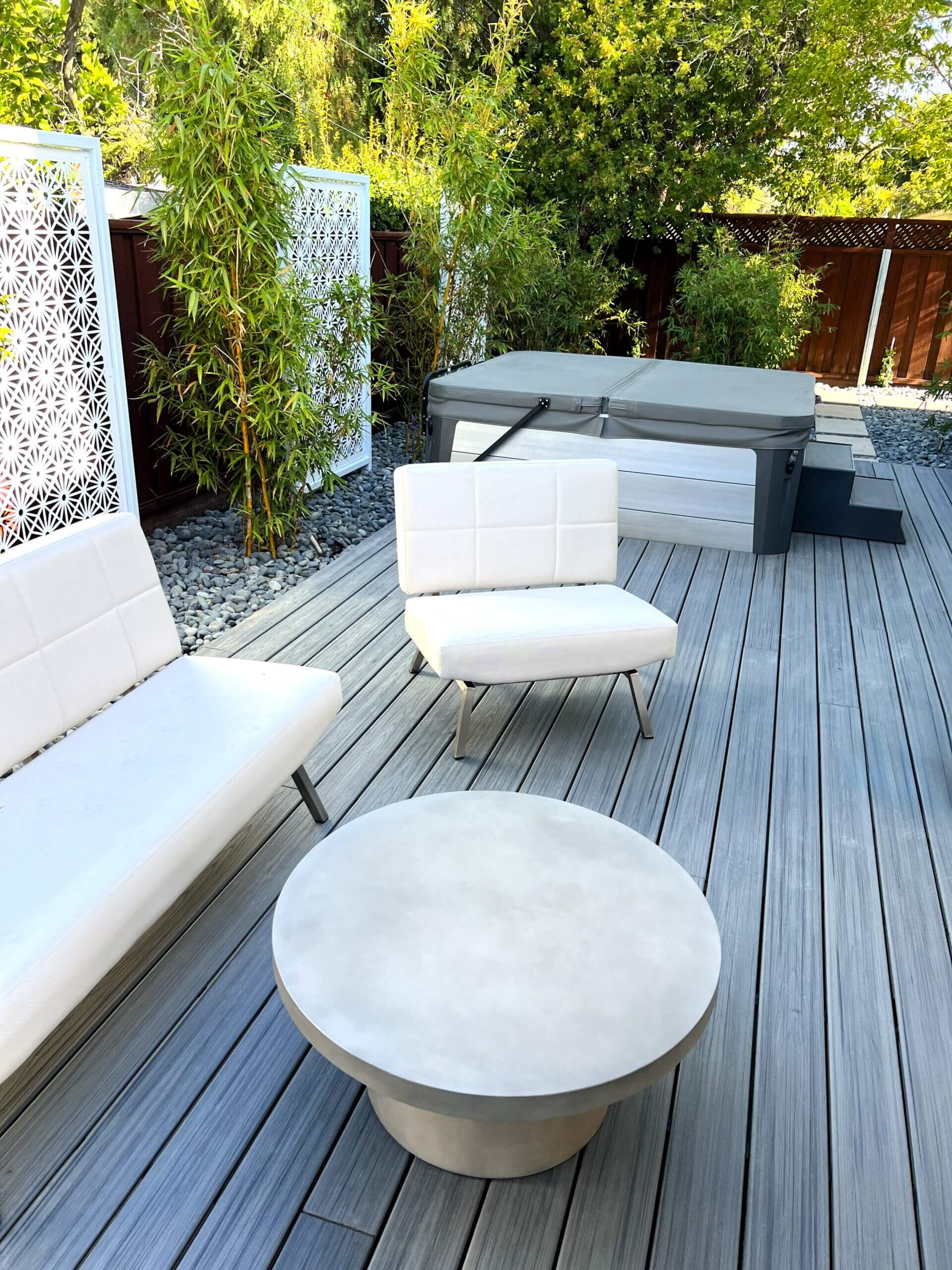 Backyard entertainment deck with spa for Eichler home landscape remodel