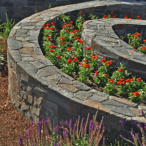 garden design spiral curved stone wall